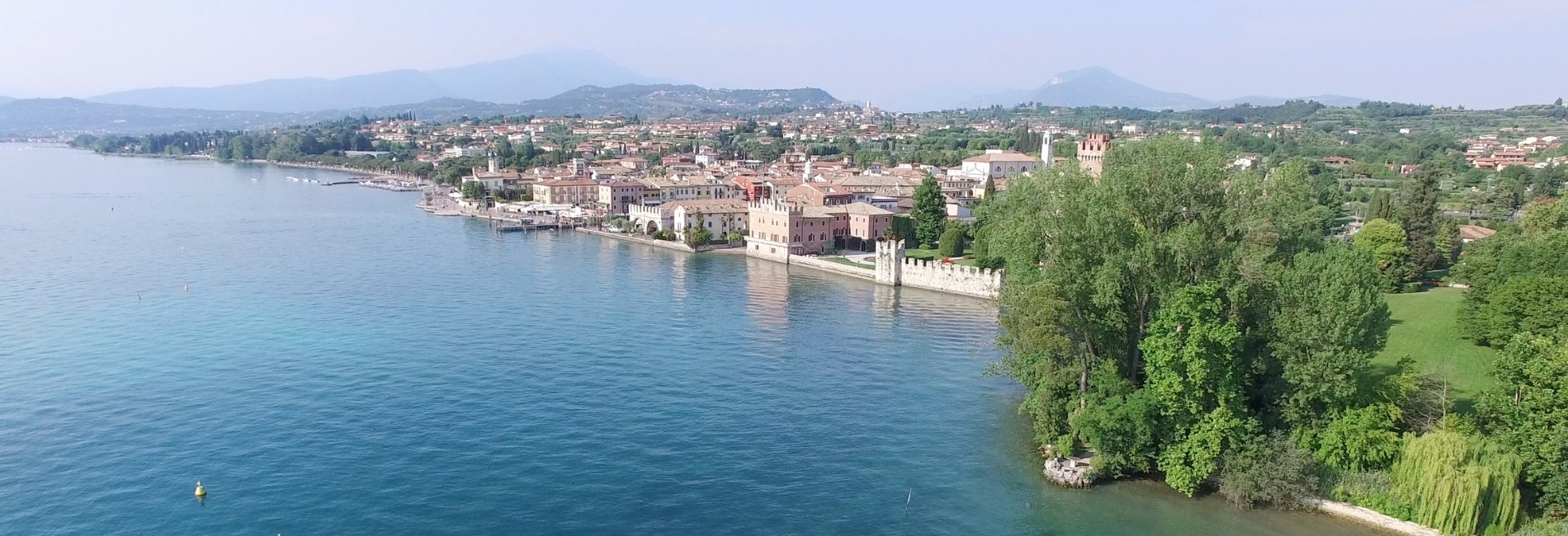 LAGO DI GARDA SPONDA VERONESE - TERRENO EDIFICABILE 10 ETTARI CON VISTA LAGO, OLTRE AZIENDA AGRICOLA CON AGRITURISMO