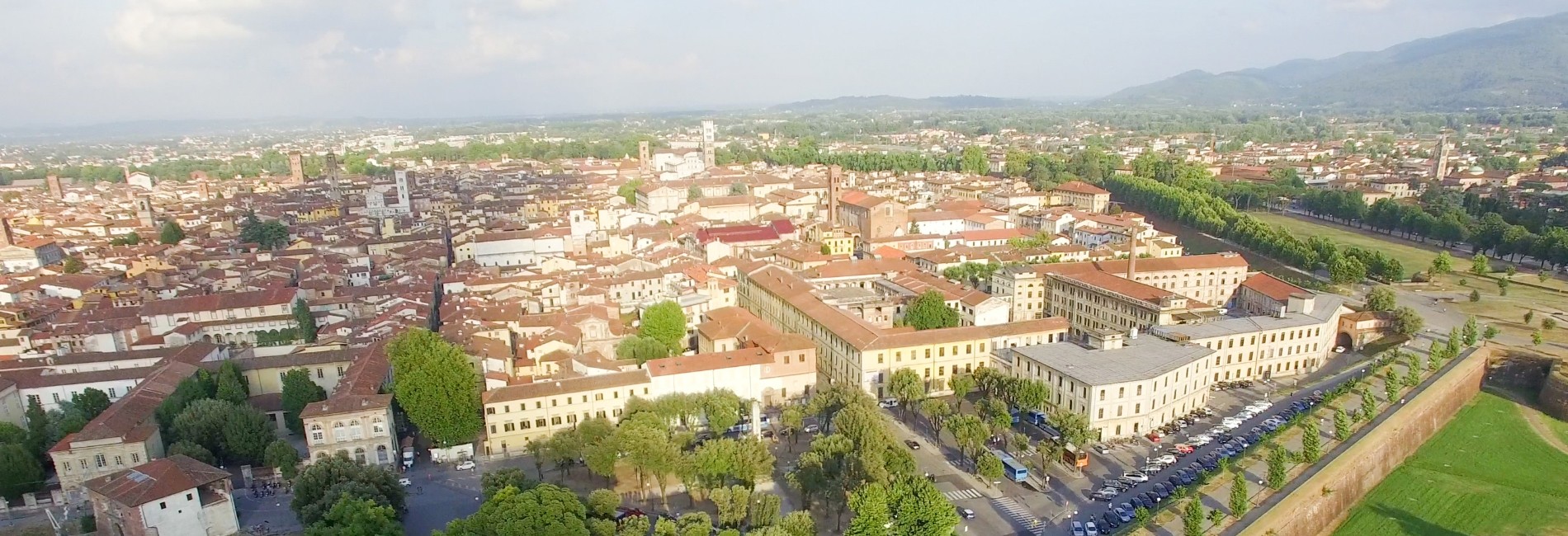 RICERCHIAMO AMPIO COMPLESSO IMMOBILIARE - PISA O LUCCA